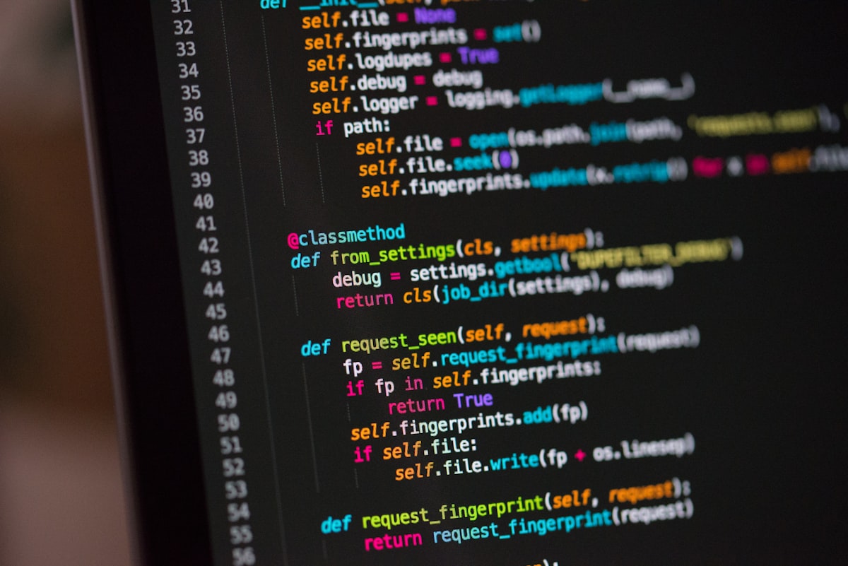 Computer screen displaying code representing CSS grid two-dimensional structural layouts